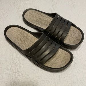 Nike sandals.  Men’s 9 (women’s 10.5)